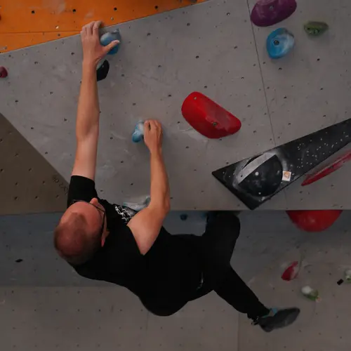 bouldering action in hall